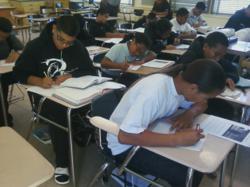 Students taking a financial literacy test